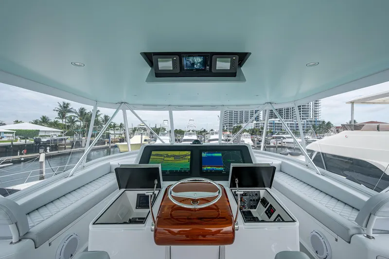 Ebitda Yacht Photos Pics Helm of 2009 Viking 60 Convertible yacht with advanced navigation systems.