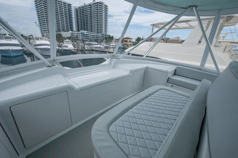 Ebitda Yacht Photos Pics Luxurious interior of 2009 Viking 60 Convertible yacht with marina view.