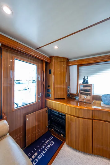 Ebitda Yacht Photos Pics Luxurious interior of 2009 Viking 60 Convertible yacht with polished wood cabinetry.