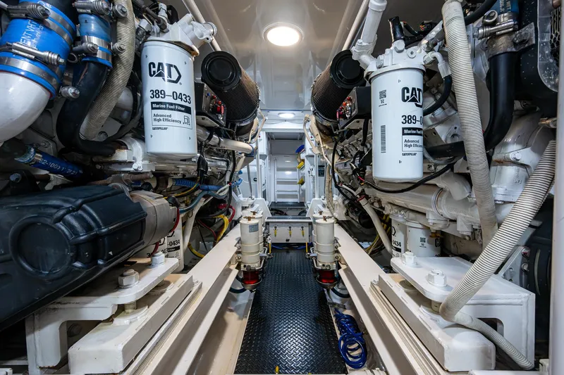 Ebitda Yacht Photos Pics Engine room of 2009 Viking 60 Convertible yacht, featuring CAT marine fuel filters.