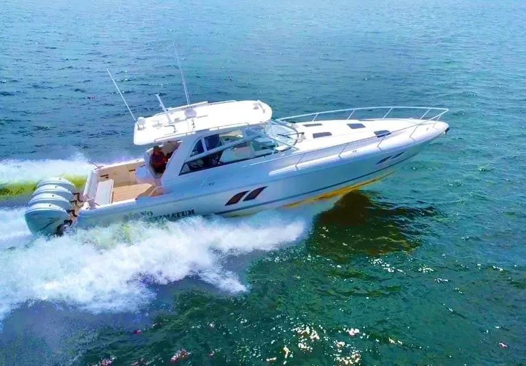  Yacht Photos Pics 2020 Intrepid 475 Sport Yacht cruising on open water, showcasing sleek design and powerful engines.