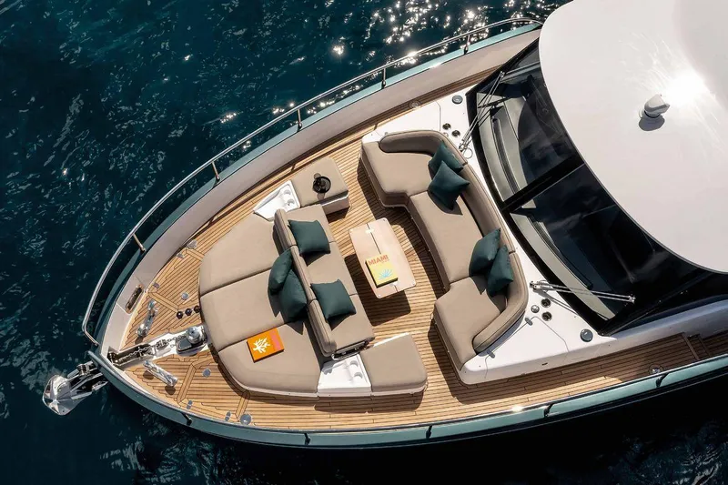  Yacht Photos Pics 2024 Azimut Magellano 60 yacht deck with luxurious seating and ocean view.