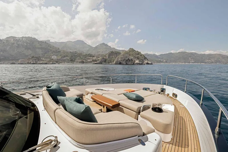  Yacht Photos Pics Luxurious 2024 Azimut Magellano 60 yacht deck with scenic ocean and mountain views.