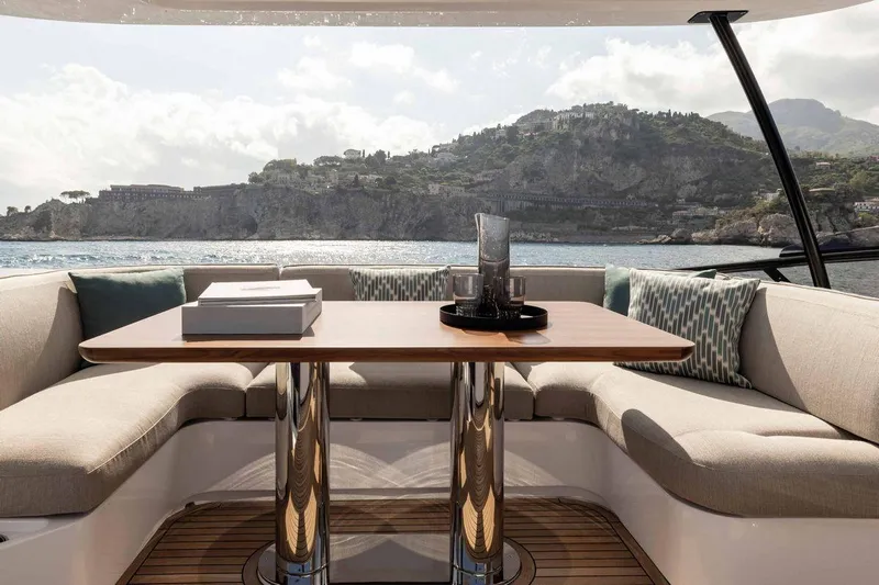  Yacht Photos Pics Luxurious seating area on 2024 Azimut Magellano 60 yacht with scenic ocean view.