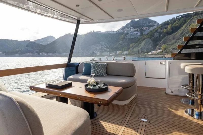  Yacht Photos Pics Luxurious 2024 Azimut Magellano 60 yacht interior with scenic ocean and mountain views.