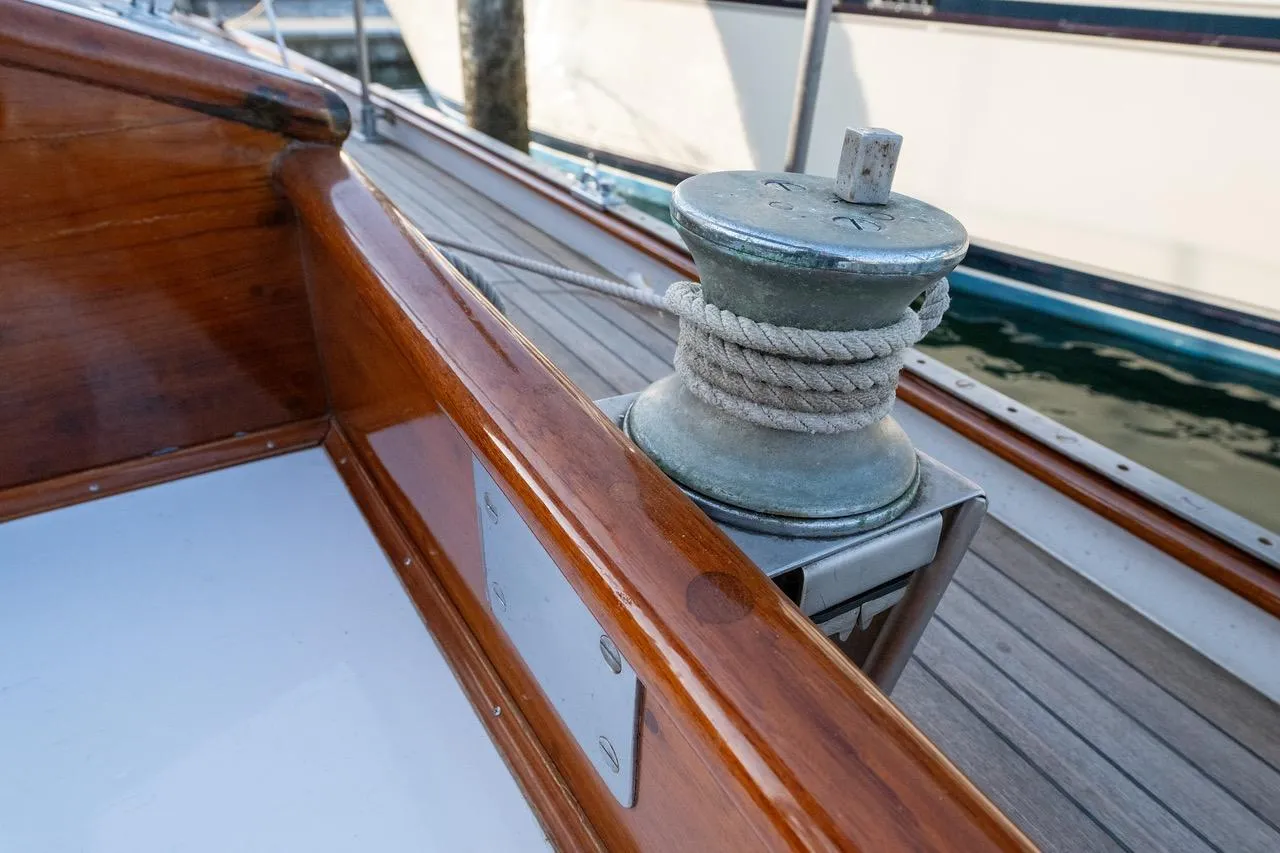 Vintage 1938 Philip Rhodes Cutter with wooden deck and winch detail.