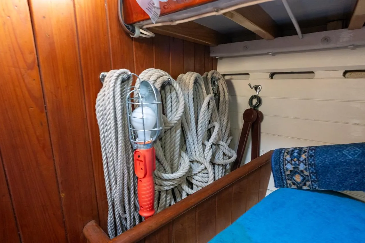 1938 Philip Rhodes Cutter interior with coiled ropes and nautical lamp.