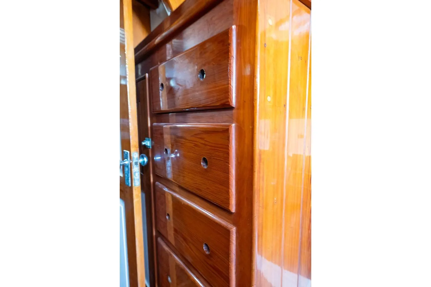 Polished wooden drawers inside a 1938 Philip Rhodes Cutter boat.