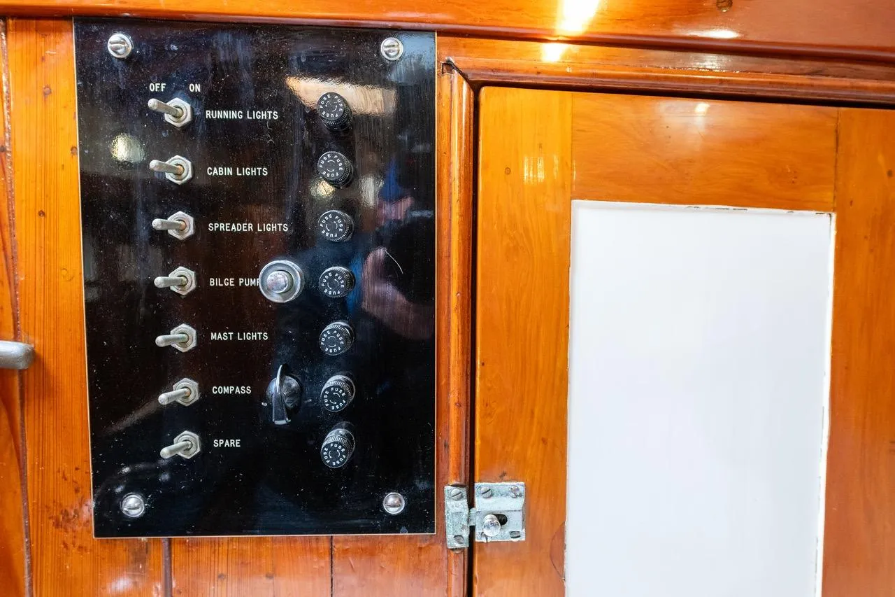 Control panel on a 1938 Philip Rhodes Cutter, featuring switches for various boat functions.