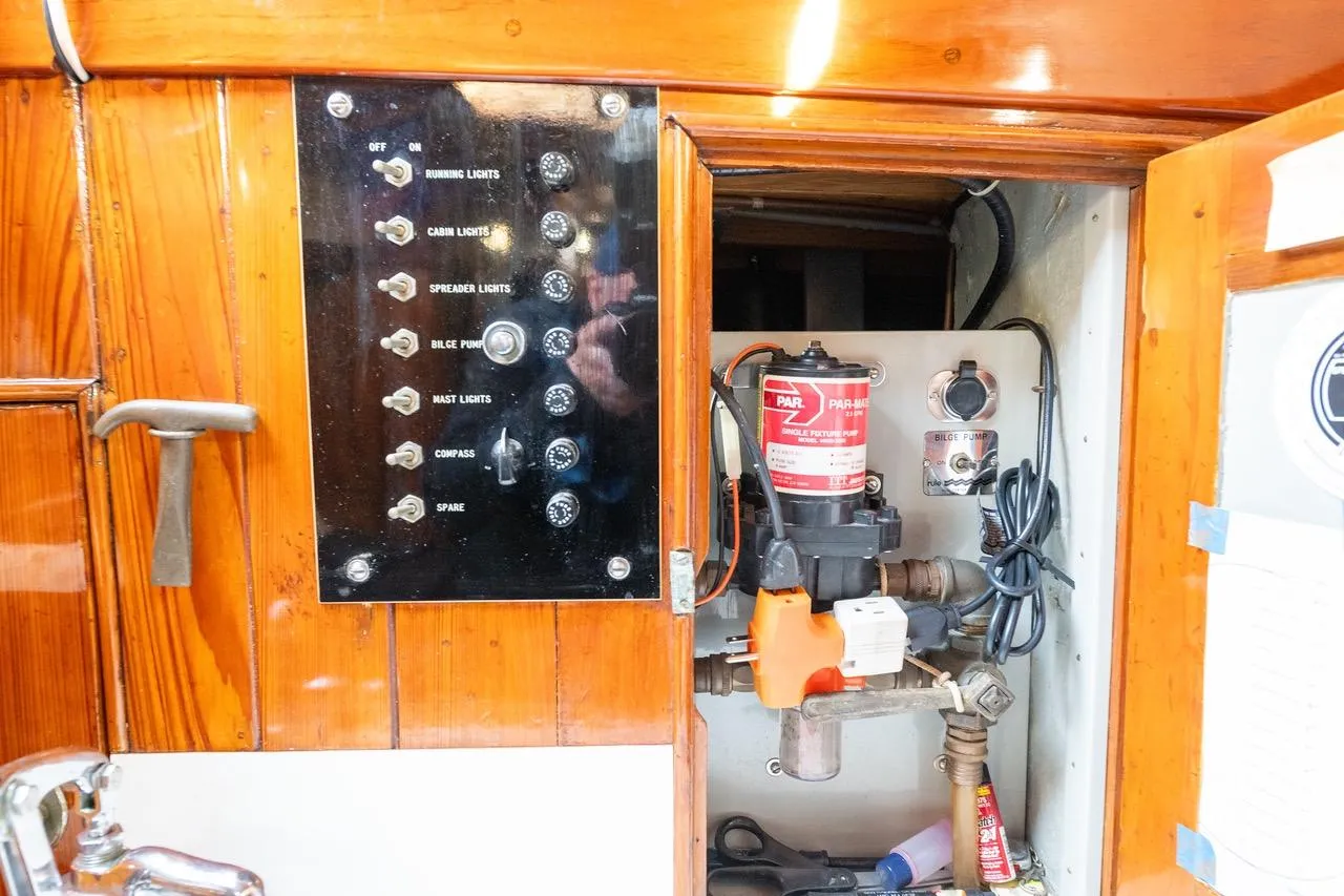 Electrical panel and bilge pump system on a 1938 Philip Rhodes Cutter sailboat.