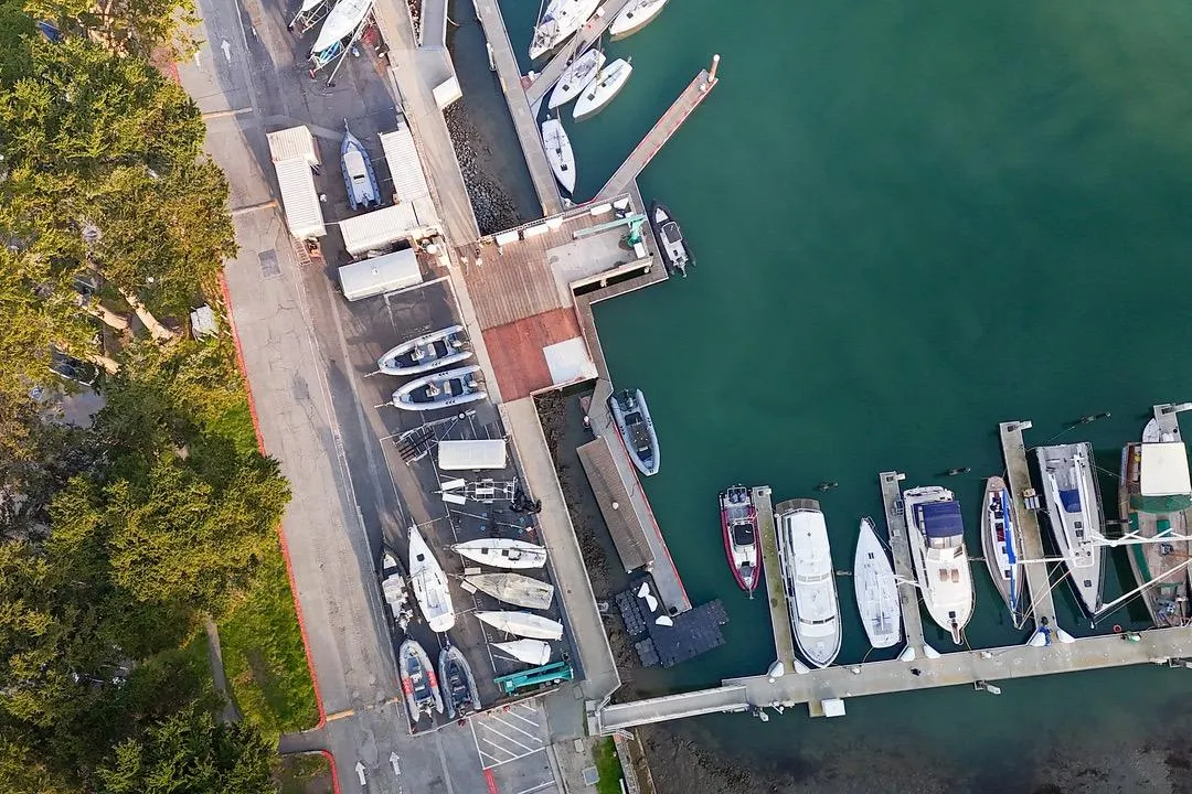 Aerial view of marina with boats, including a 1938 Philip Rhodes Cutter.
