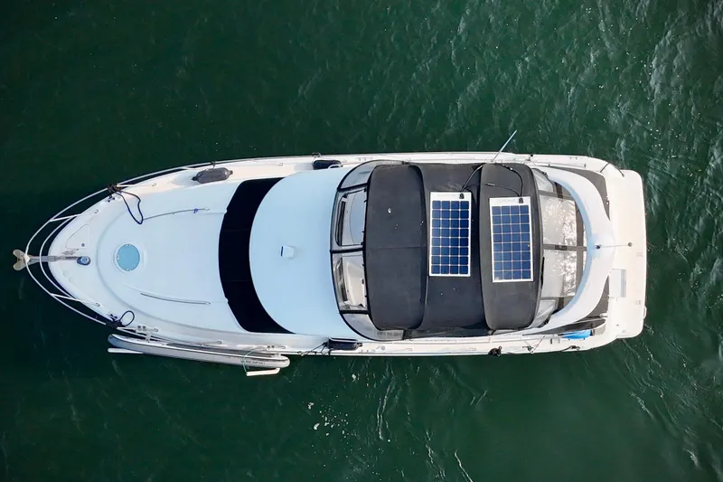  Yacht Photos Pics Aerial view of 2003 Meridian 341 Sedan yacht with solar panels on the roof.