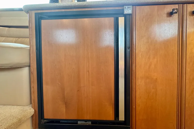  Yacht Photos Pics Wooden cabinet interior of 2003 Meridian 341 Sedan yacht.