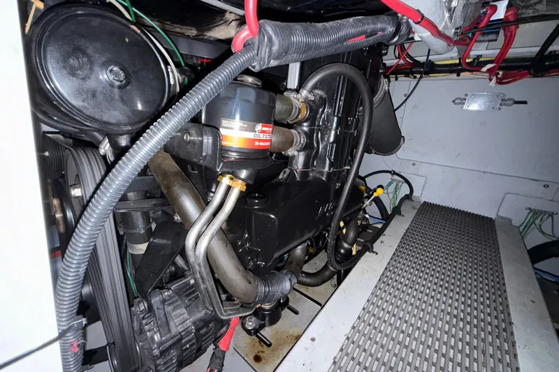  Yacht Photos Pics Engine compartment of a 2003 Meridian 341 Sedan with visible oil filter and wiring.