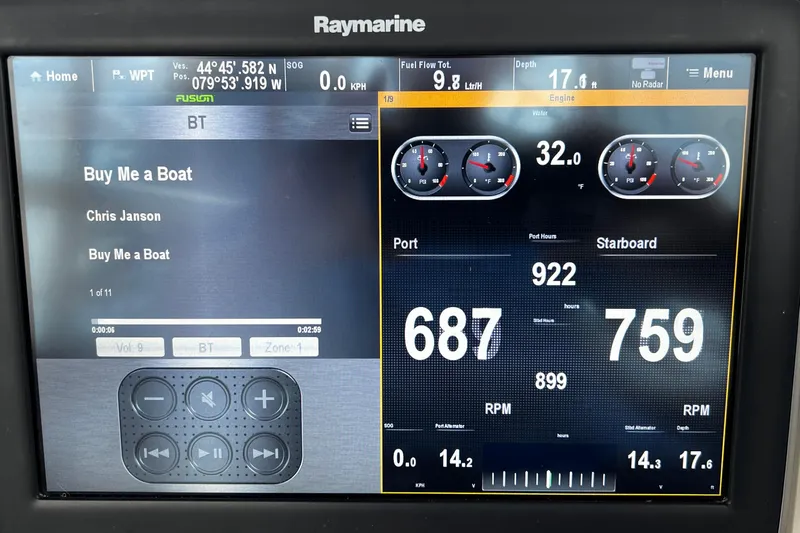  Yacht Photos Pics Raymarine display on 2003 Meridian 341 Sedan showing navigation and music controls.