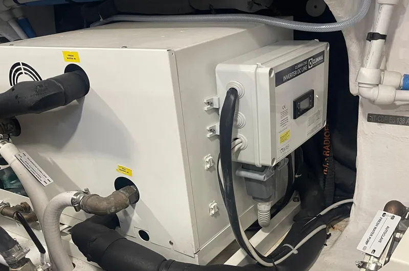  Yacht Photos Pics Engine room equipment of 2024 Pardo Yachts E60, featuring control panel and piping.