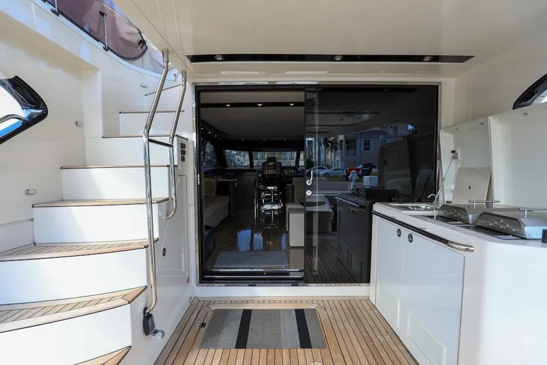  Yacht Photos Pics 2016 Marquis 660 Sport Yacht interior with modern design and luxurious amenities.