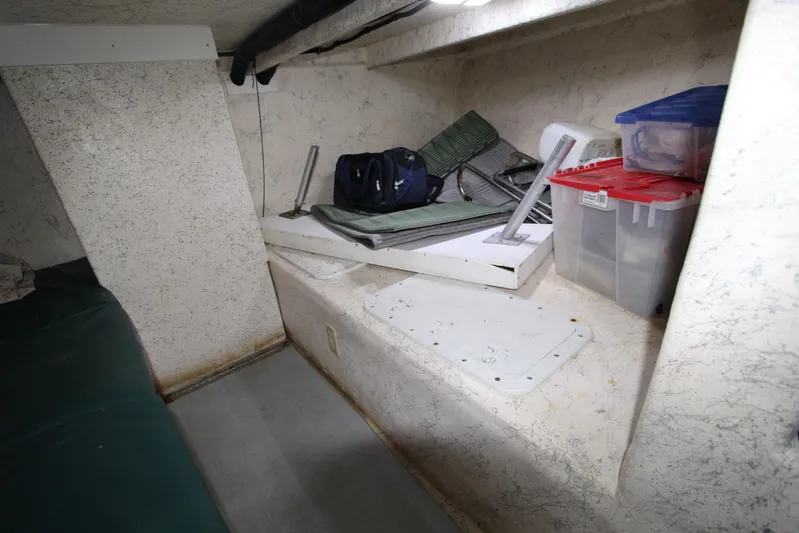  Yacht Photos Pics Interior cabin of 2006 Island Hopper Sportfisher with storage and equipment.