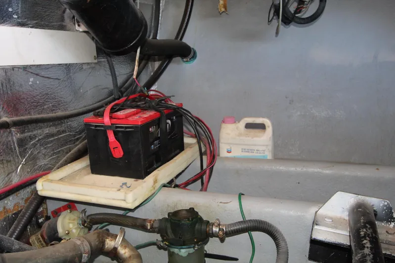  Yacht Photos Pics Battery and wiring inside 2006 Island Hopper Sportfisher boat engine compartment.
