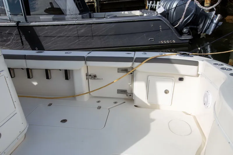 Evil Tequila Yacht Photos Pics 2015 Yellowfin 39 Offshore boat interior with seating and storage compartments.