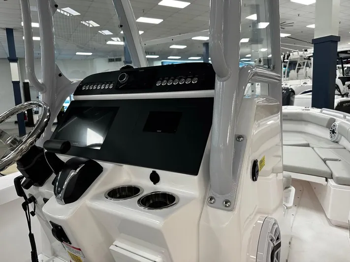  Yacht Photos Pics 2023 Everglades 243 Center Console boat interior with modern dashboard and seating.
