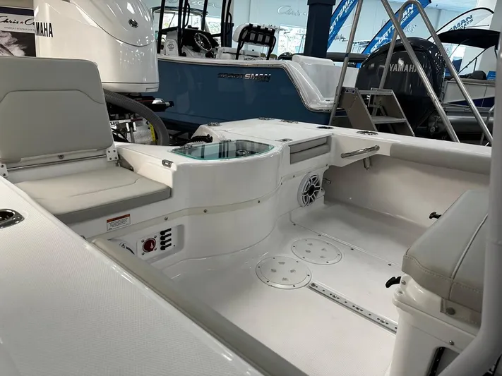  Yacht Photos Pics 2023 Everglades 243 Center Console boat interior with seating and Yamaha engine.