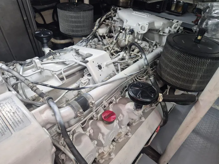  Yacht Photos Pics Engine of a 1998 Riva Dolce Vita yacht, showcasing intricate mechanical components.