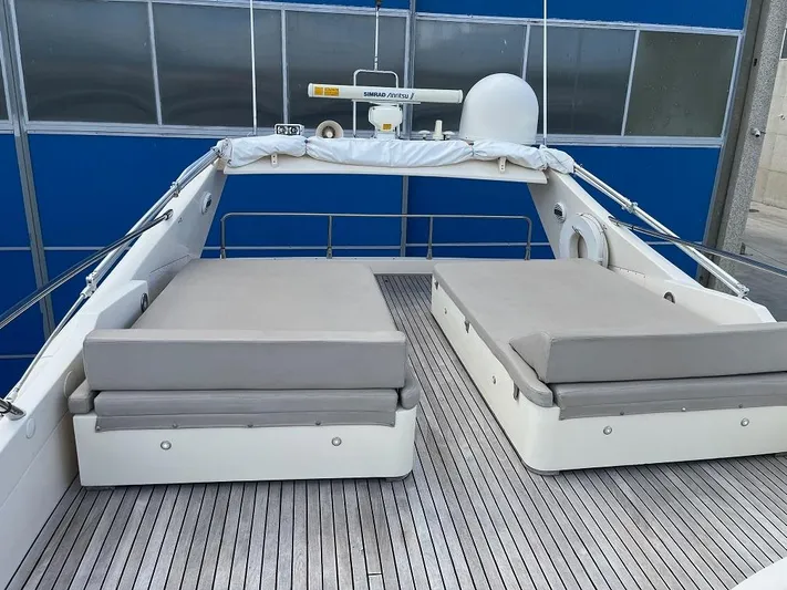  Yacht Photos Pics Luxury 1998 Riva Dolce Vita yacht deck with cushioned seating and modern design.