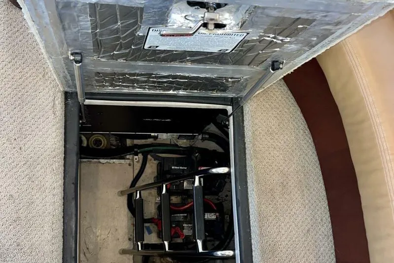 Reflections Yacht Photos Pics 2005 Sea Ray 390 Motor Yacht engine compartment with visible battery and wiring.