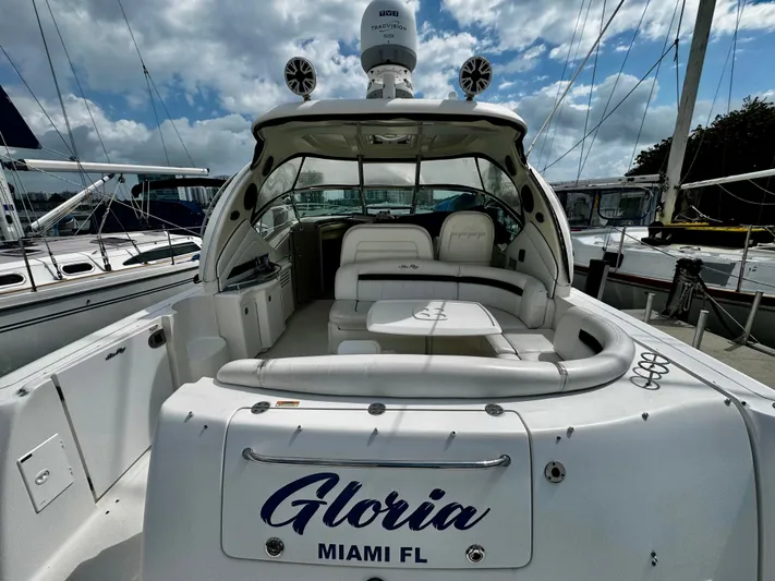 Gloria Yacht Photos Pics 2007 Sea Ray 40 Sundancer yacht docked, featuring spacious seating and sleek design.