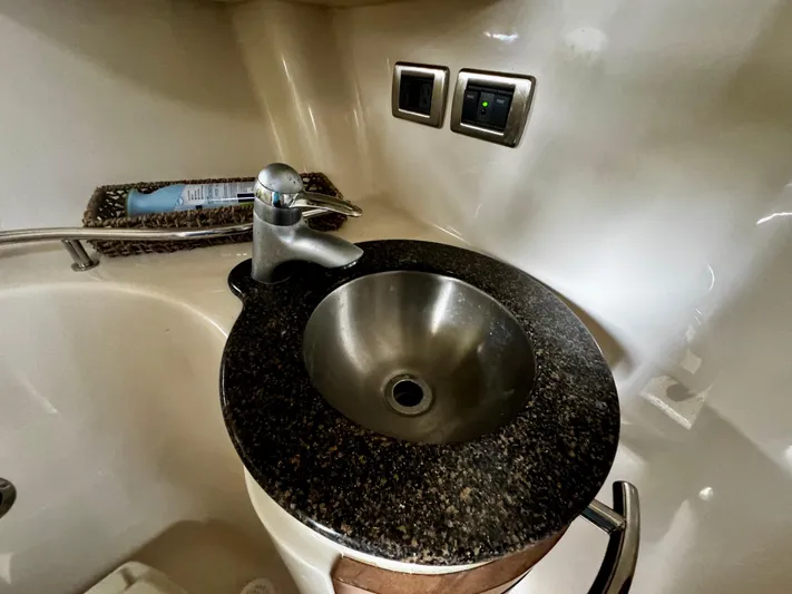 Gloria Yacht Photos Pics Stainless steel sink in 2007 Sea Ray 40 Sundancer yacht bathroom.