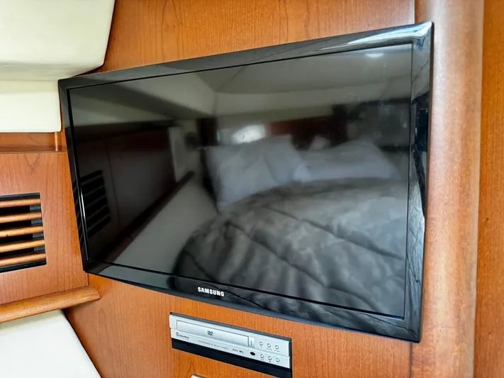 Gloria Yacht Photos Pics Samsung TV and DVD player in 2007 Sea Ray 40 Sundancer yacht interior.
