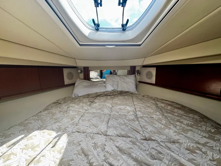Gloria Yacht Photos Pics Luxurious cabin interior of 2007 Sea Ray 40 Sundancer yacht with skylight.