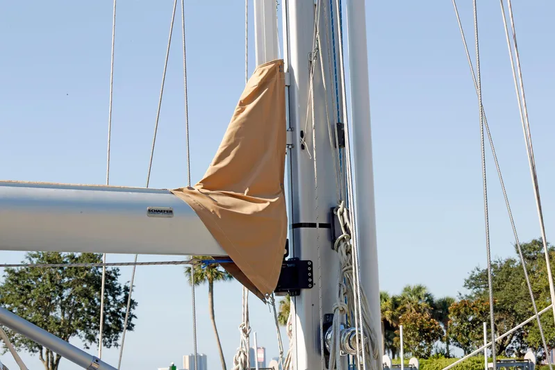 Legacy Yacht Photos Pics Mast and boom of 2012 Hylas 49CC sailboat with tan sail cover.