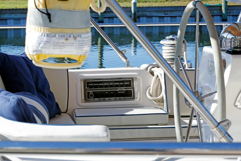 Legacy Yacht Photos Pics 2012 Hylas 49CC yacht cockpit with control panel and life preserver.