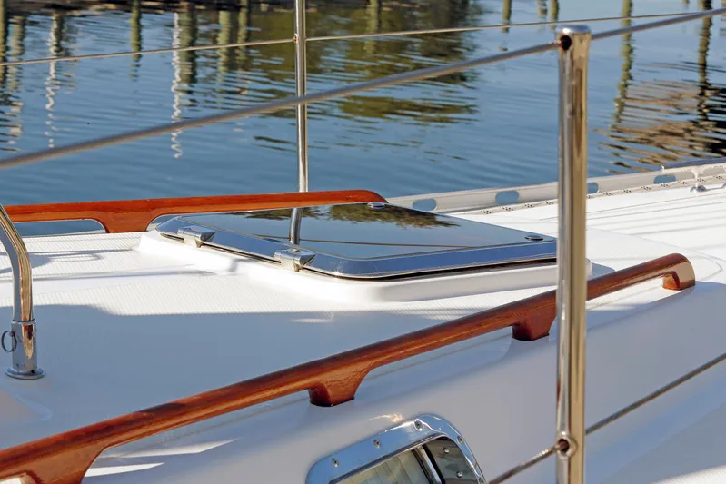 Legacy Yacht Photos Pics Deck of 2012 Hylas 49CC yacht with polished wood and metal details.