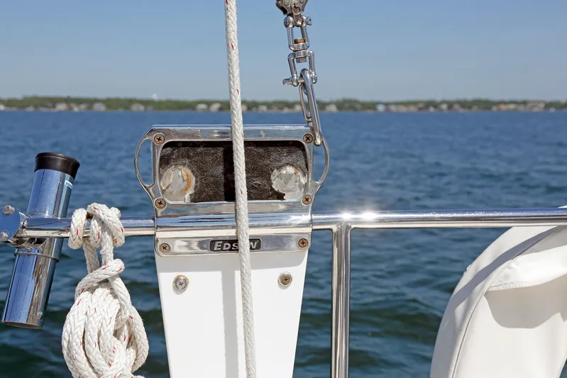 Legacy Yacht Photos Pics Sailboat deck view with ropes and equipment, Hylas 49CC, 2012 model, on open water.