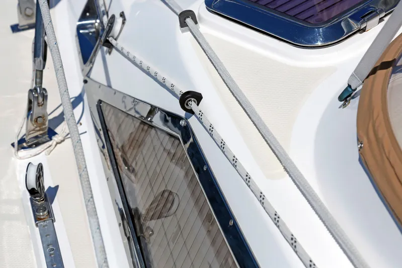 Legacy Yacht Photos Pics Close-up of 2012 Hylas 49CC yacht deck with ropes and fittings.