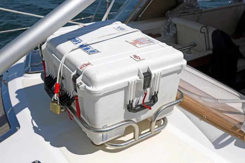 Legacy Yacht Photos Pics White storage box secured on a Hylas 49CC yacht, 2012 model, with padlock and cables.