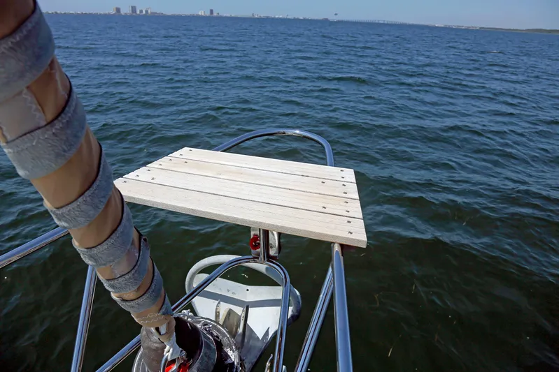 Legacy Yacht Photos Pics Sailboat bow with wooden platform on open water, Hylas 49CC, 2012 model.