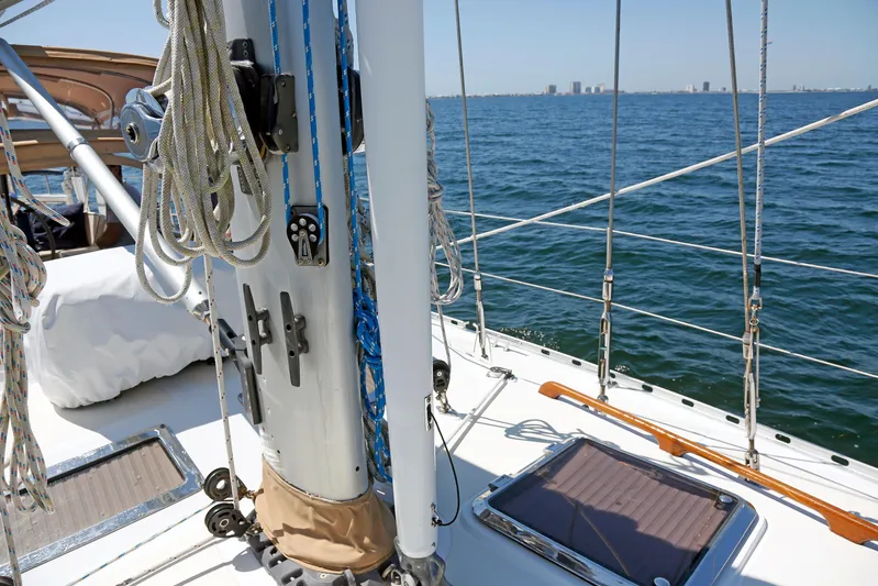Legacy Yacht Photos Pics Sailboat deck view, Hylas 49CC, 2012 model, with ropes and ocean backdrop.