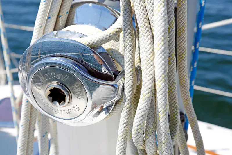 Legacy Yacht Photos Pics Close-up of a winch with ropes on a 2012 Hylas 49CC sailboat.