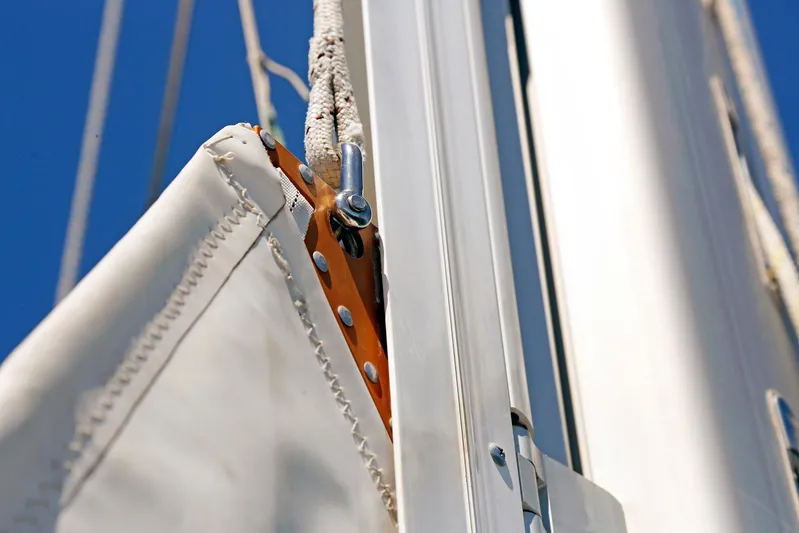 Legacy Yacht Photos Pics Close-up of a Hylas 49CC sailboat mast and sail detail, 2012 model.