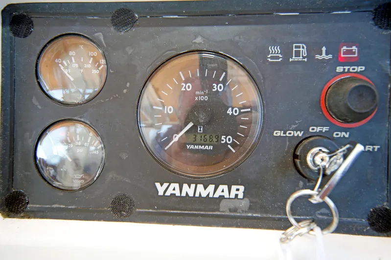 Legacy Yacht Photos Pics Yanmar engine control panel with gauges and ignition key, Hylas 49CC 2012 model.