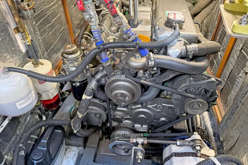 Legacy Yacht Photos Pics Engine compartment of a 2012 Hylas 49CC, showcasing detailed mechanical components.