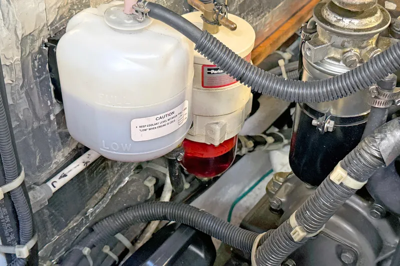 Legacy Yacht Photos Pics Engine compartment of a 2012 Hylas 49CC with coolant reservoir and fuel filter.