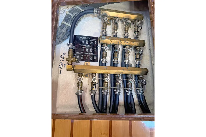 Legacy Yacht Photos Pics Fuel system with brass valves and hoses in a 2012 Hylas 49CC boat.