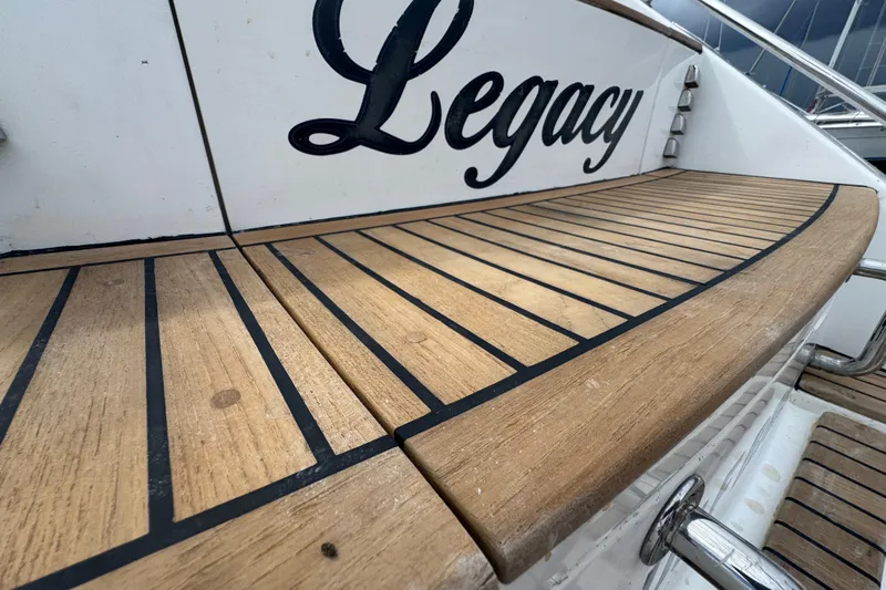 Legacy Yacht Photos Pics Teak deck of 2012 Hylas 49CC yacht named "Legacy" with stainless steel fittings.