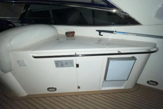 Cover Girl Yacht Photos Pics 1997 Sunseeker Camargue 51 yacht interior with sleek cabinetry and modern design.