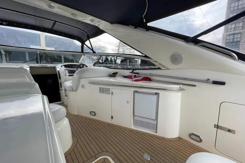 Cover Girl Yacht Photos Pics Interior view of 1997 Sunseeker Camargue 51 yacht with sleek design and modern amenities.
